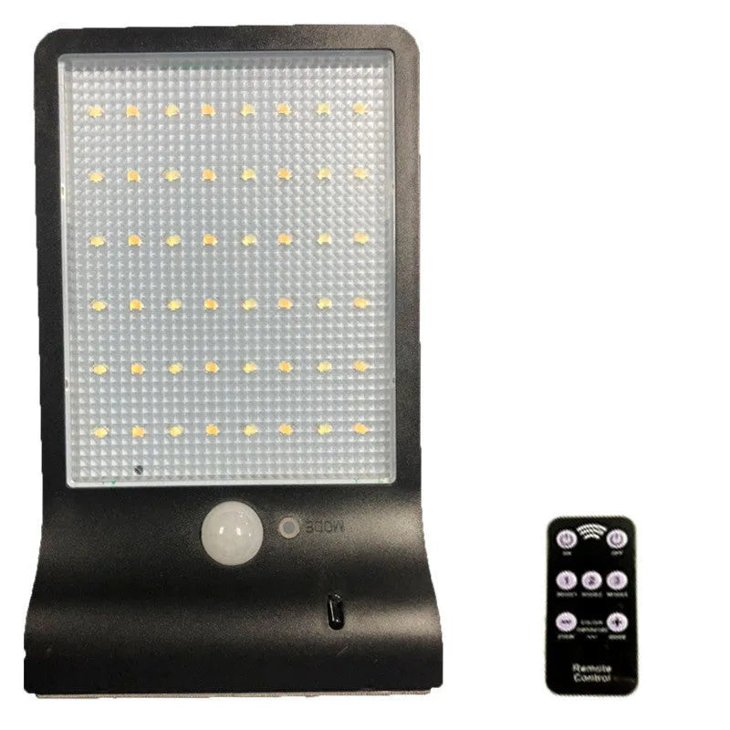 Black and white outdoor solar garden light with IP65 waterproof rating for balcony and courtyard use