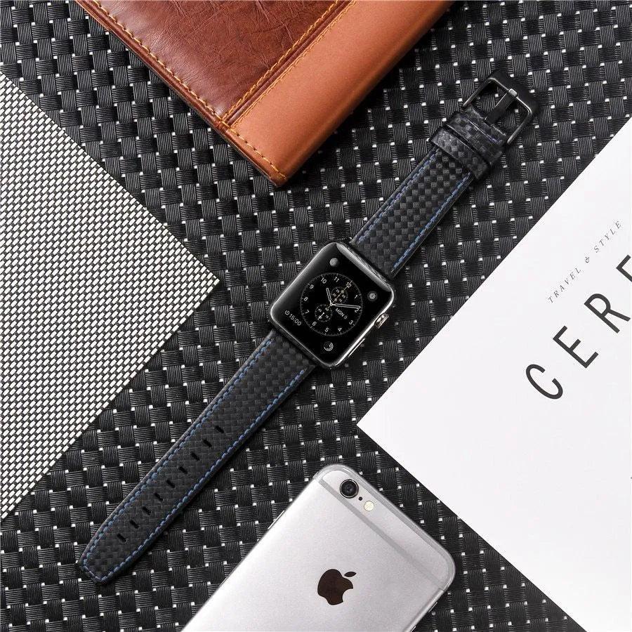 Carbon fibre and leather Apple Watch strap with patterned PC case in red, black, blue, and orange.