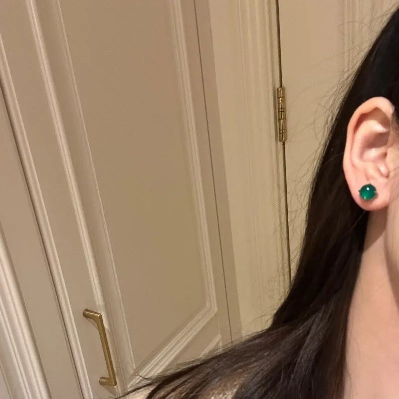 Chinese national fashion chalcedony stud earrings with round egg surface design and four-claw copper settings
