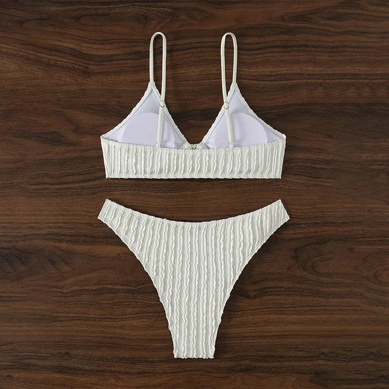 White women's V-neck swimsuit with beach split style and sleeveless design