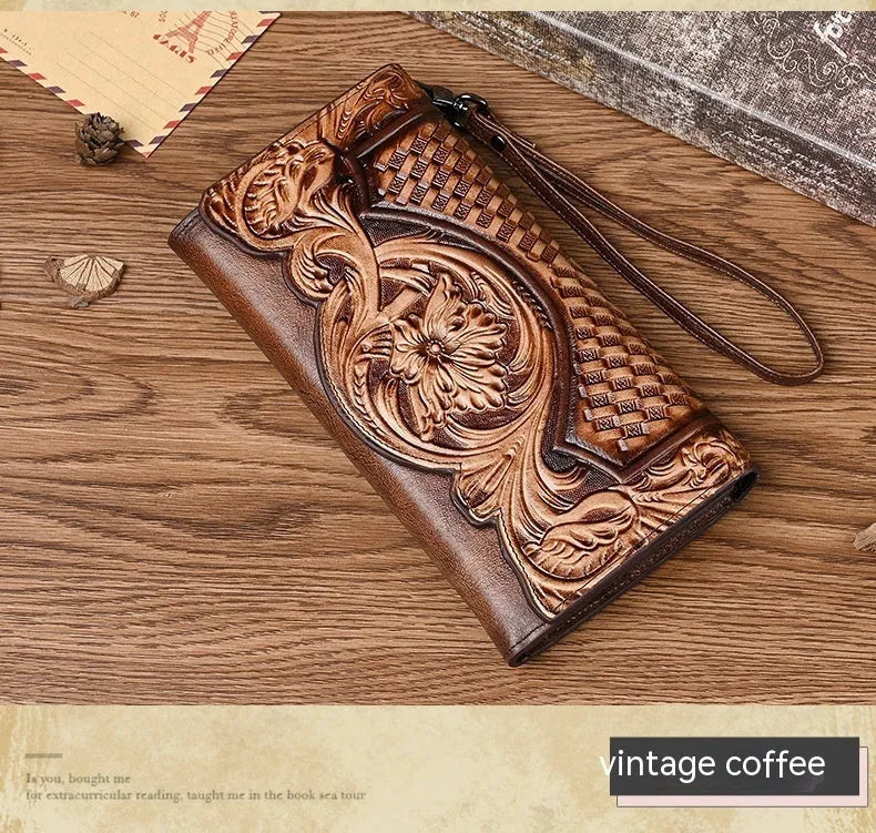 Women's brown genuine leather tri-fold wallet with embossed floral pattern showing open compartments