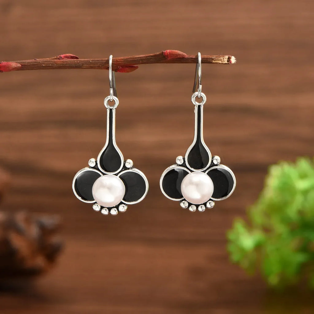 Women's retro fashion creative earrings with electroplated silver finish and drop design