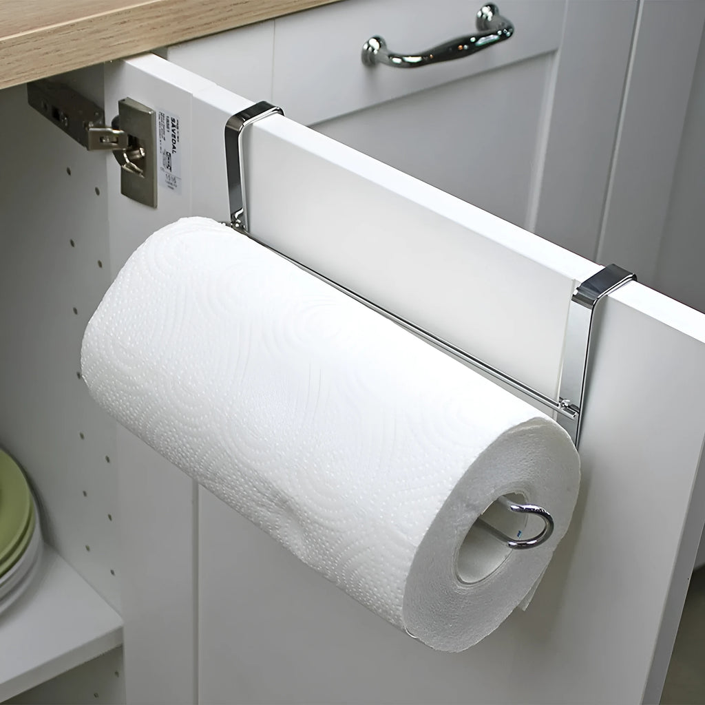 Silver stainless steel kitchen towel rack mounted on a white cabinet door.