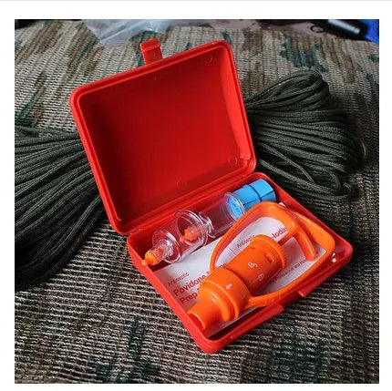 Orange outdoor venom vacuum suction device with two suction cup sizes and first aid accessories