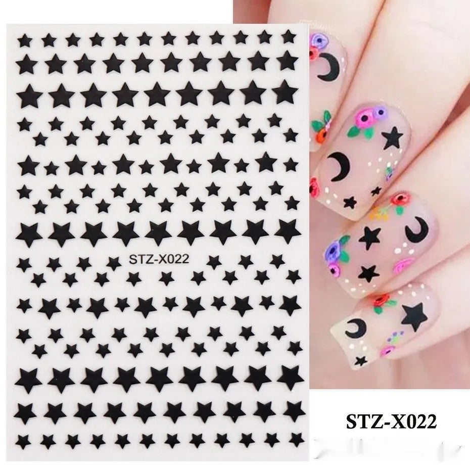 Sheet of black and silver stripe nail art stickers from a cartoon series for DIY manicures.