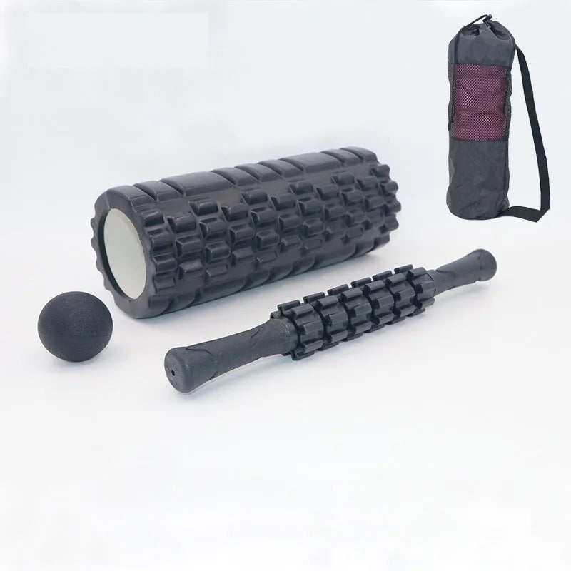 Black fitness foam roller measuring 33cm with EVA and PVC construction for muscle massage