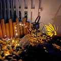 Solar garden lamp with iron butterfly pattern design and warm white LED lighting
