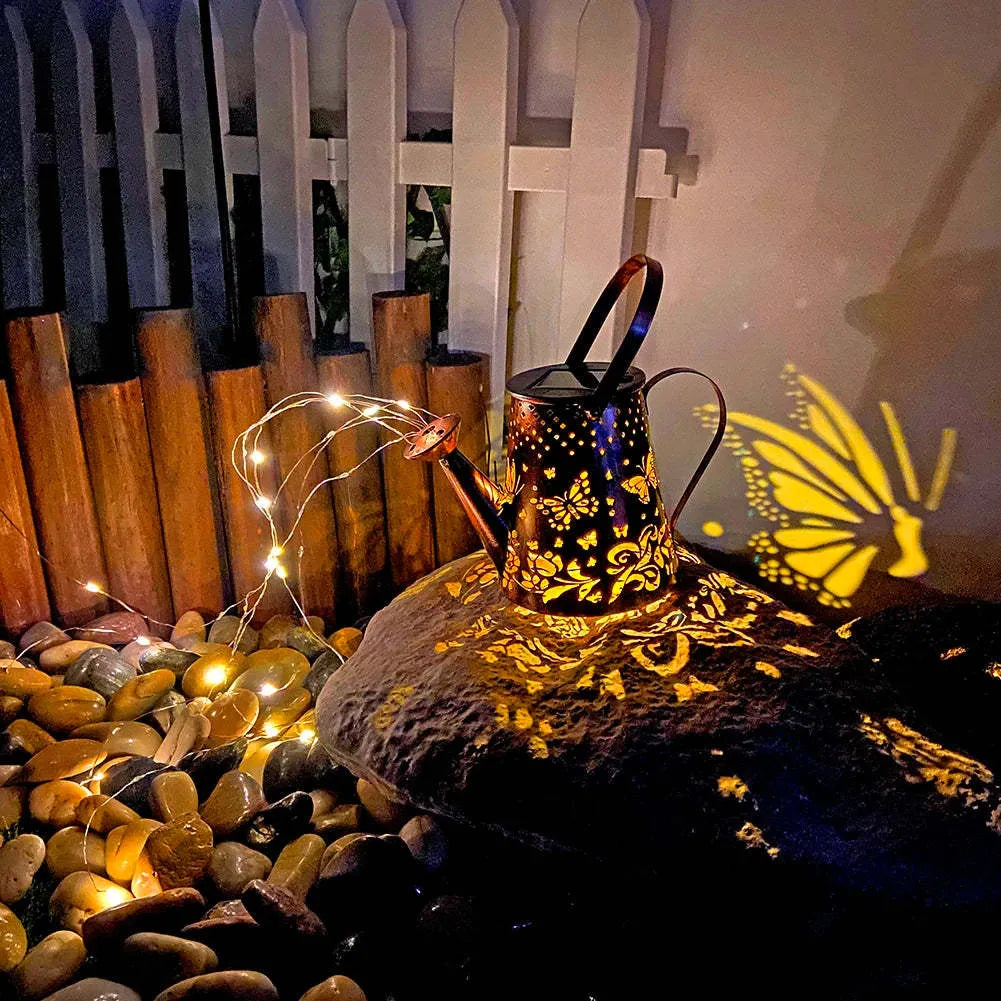 Solar garden lamp with iron butterfly pattern design and warm white LED lighting