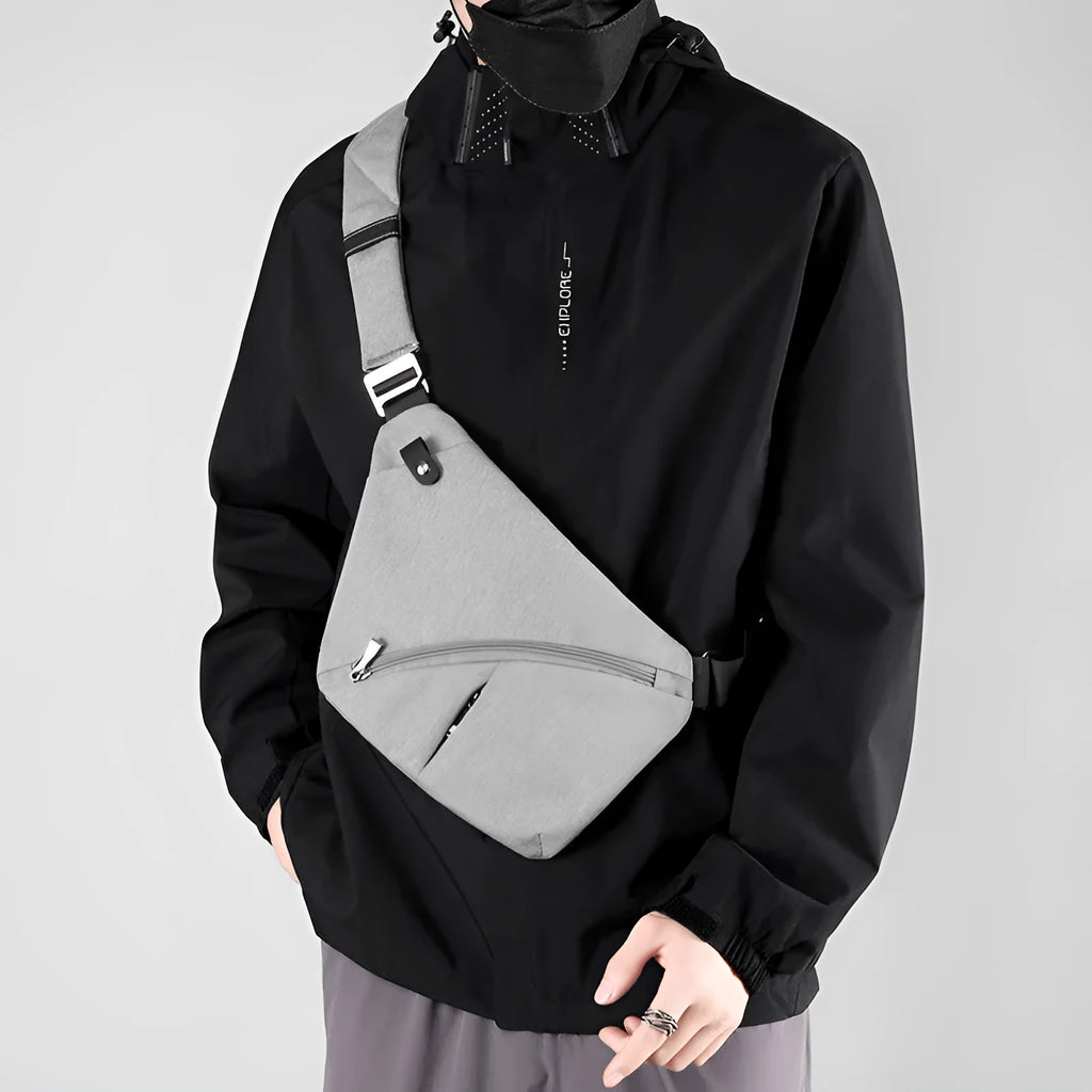 Men's Oxford cloth chest bag with single shoulder strap in grey or black colour with letter pattern.