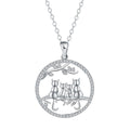 Copper necklace with four kitten pendants on a cross chain, electroplated finish.
