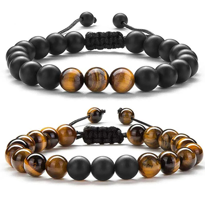Pair of matte black agate bead bracelets with geometric design for couples.
