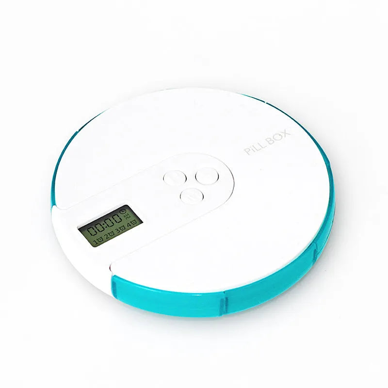 Seven-compartment alarm clock pill dispenser showing medication storage and electronic display
