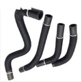 Black self-winding polyester mesh sleeve for automotive cable protection, shown in a coil.