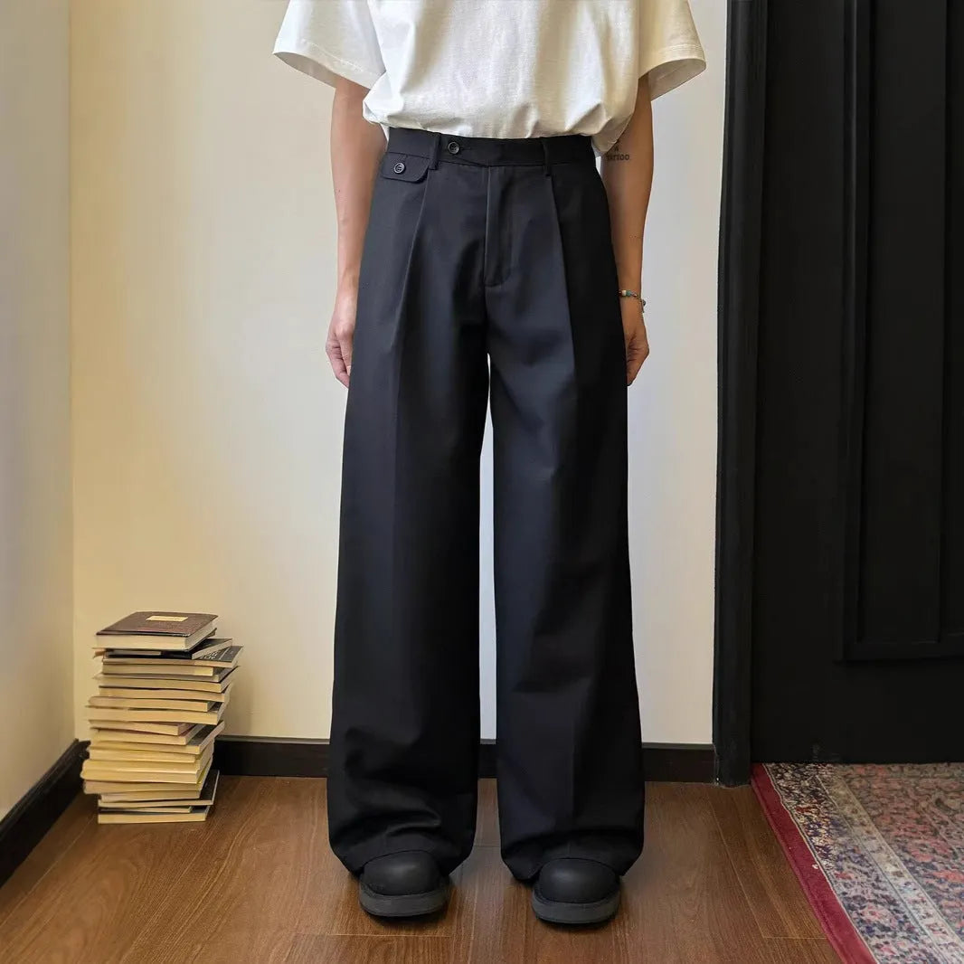 Men's brown straight-leg casual trousers with wide-leg drape fit on hanger