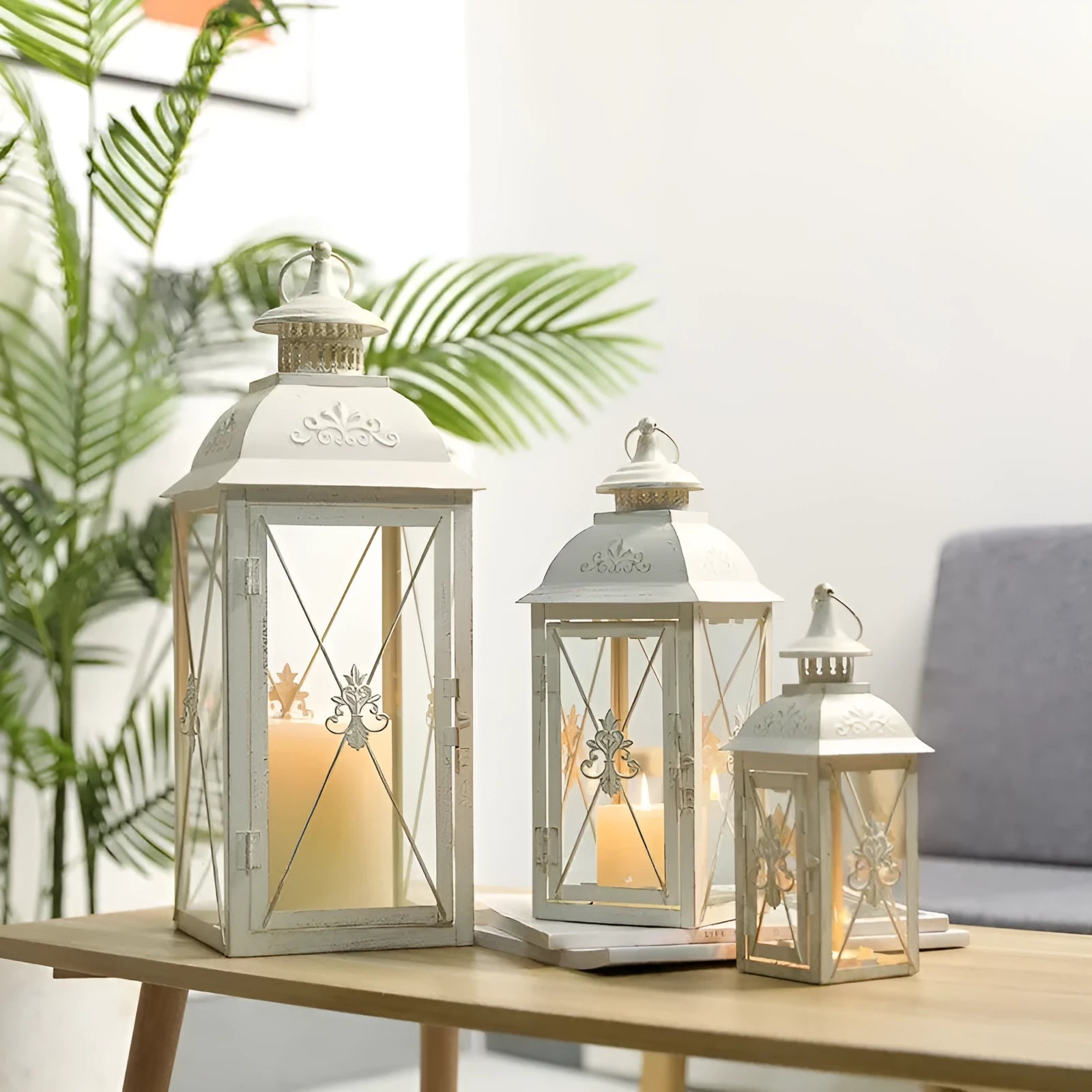 European black and white wrought iron floor-standing storm lantern with tempered glass in three sizes for courtyard decoration.