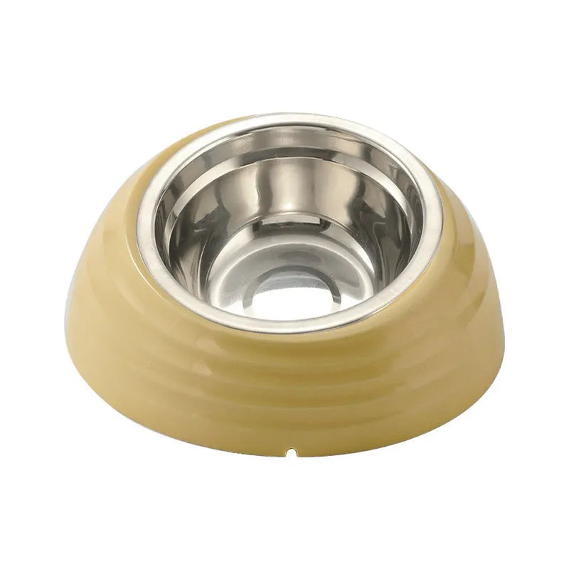 Stainless steel cat bowl with plastic base in beige, brown, or light green.