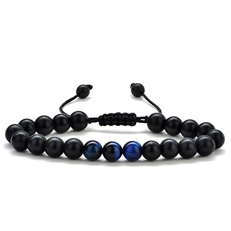 Pair of matte black agate bead bracelets with geometric design for couples.