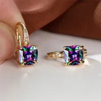Square geometric ear hook earrings with zircon stones in an electroplated copper setting.