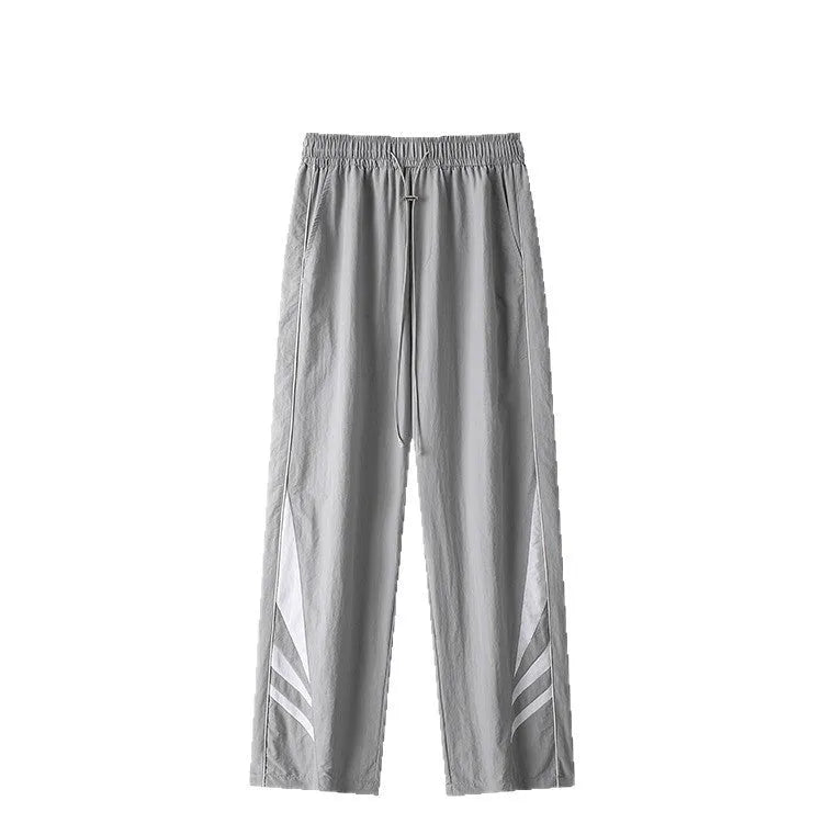Men's grey straight-leg casual trousers with a stretch waistband on a hanger.