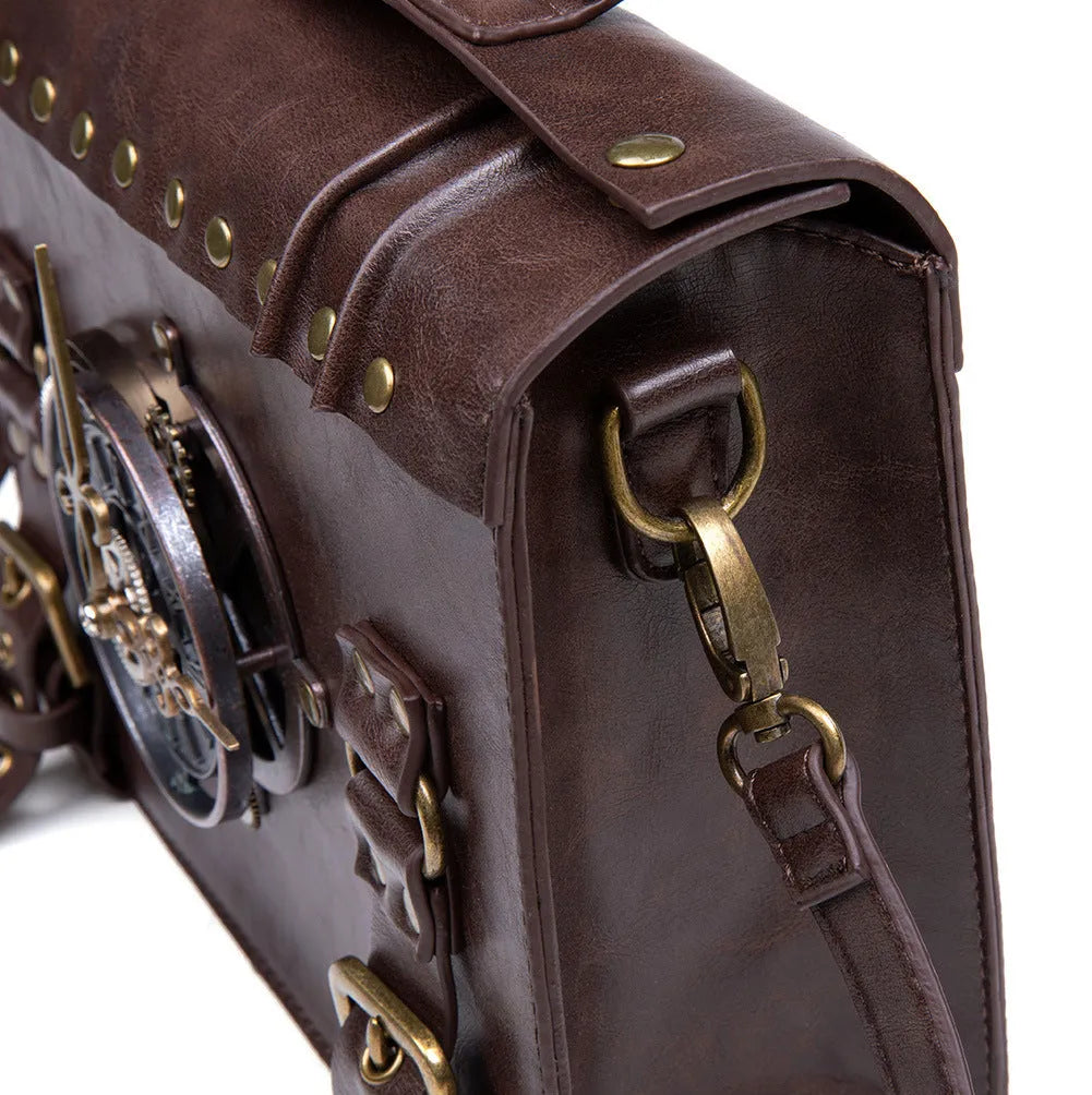 Bronze steampunk industrial retro style shoulder bag showing metal hardware details and pillow bag shape