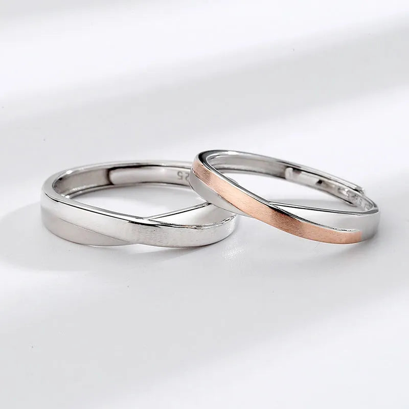 S925 sterling silver Mobius strip interwoven double knot adjustable couple ring on finger showing geometric infinity design