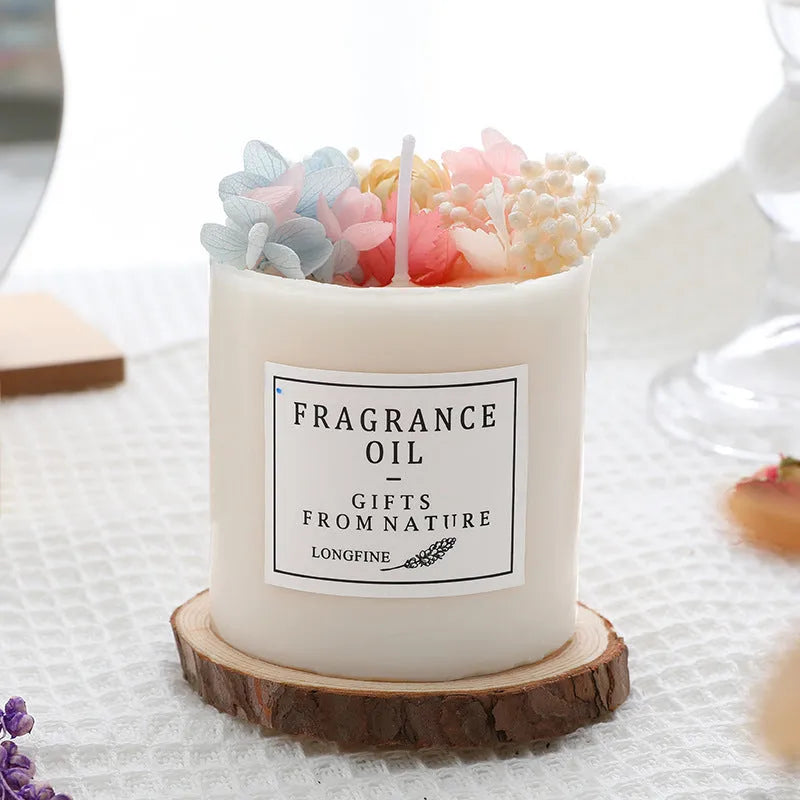 Glass jar scented candle with dried flower decoration, available in multiple fragrance options