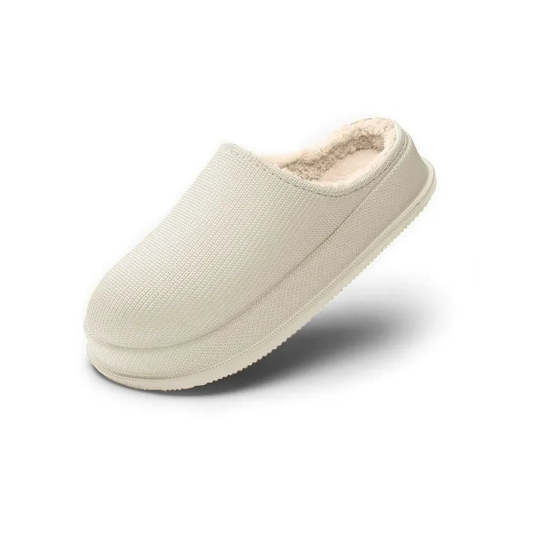 Unisex waterproof non-slip cotton slippers with EVA sole in multiple colours on a floor