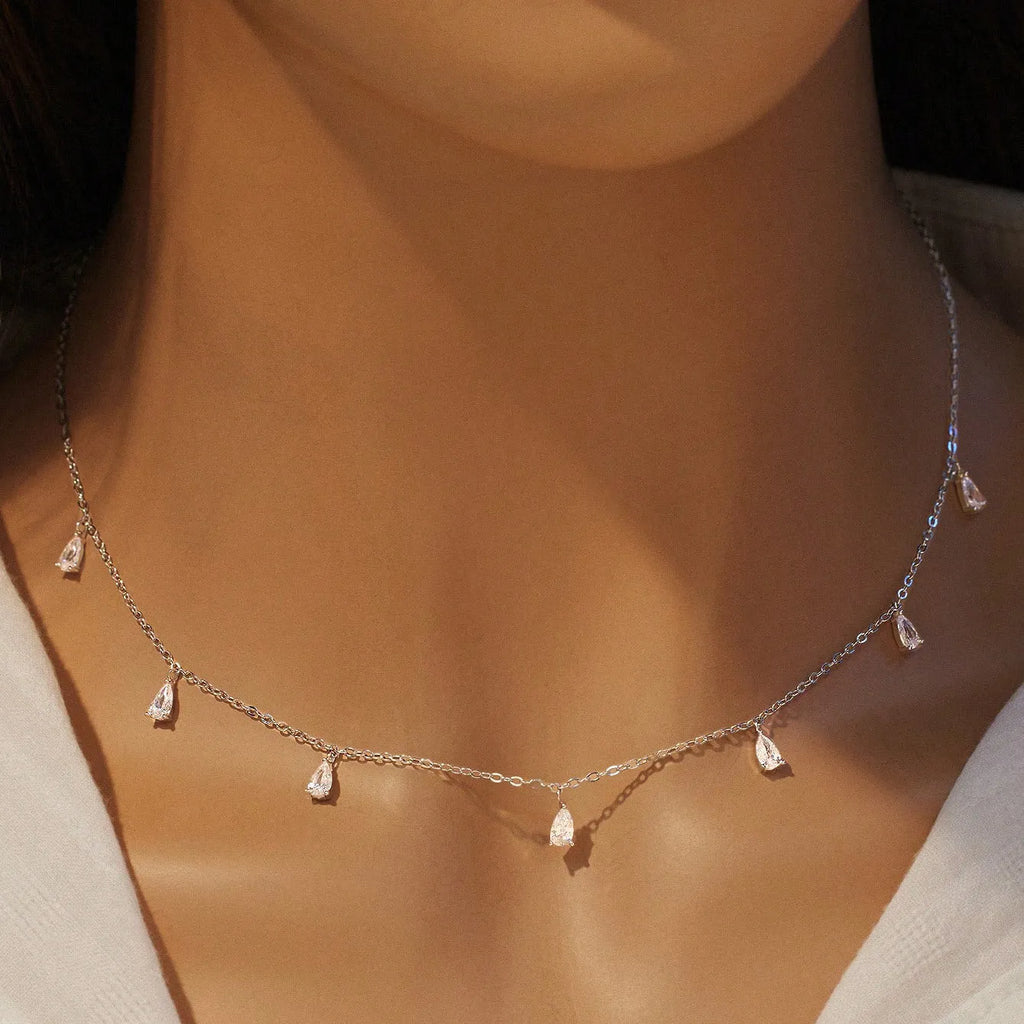 Women's silver drop-shaped artificial zircon necklace with adjustable 41-50cm chain on jewellery display