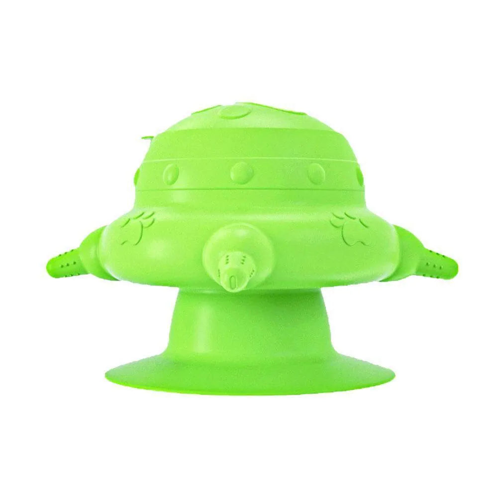 Pink silicone pet nursing milk bowl with four attached pacifiers on a flat base.