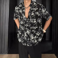 Men's loose fitting floral print short sleeve casual shirt in black and white colour options