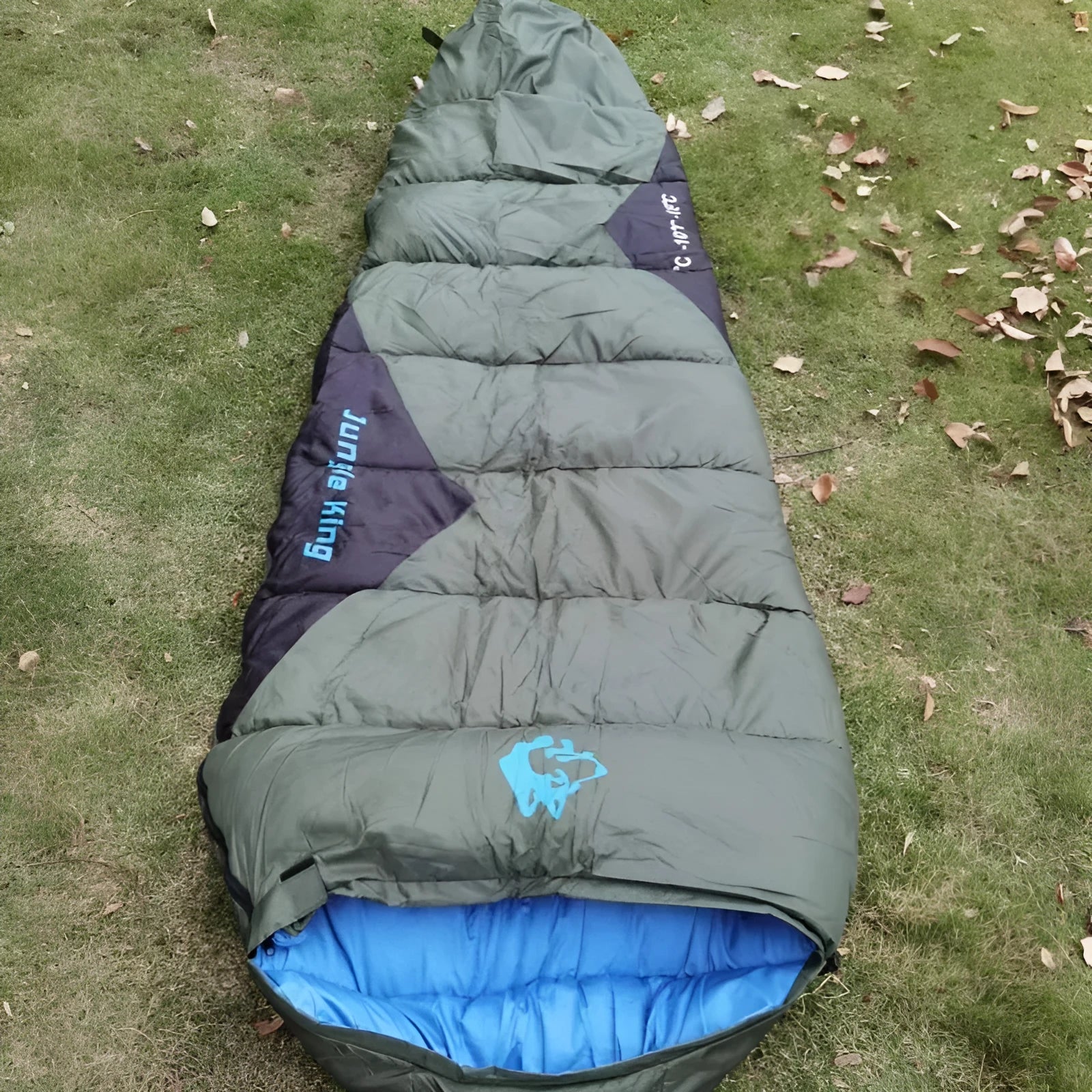 Mummy style camping sleeping bag in Army Green colour with compression storage bag.
