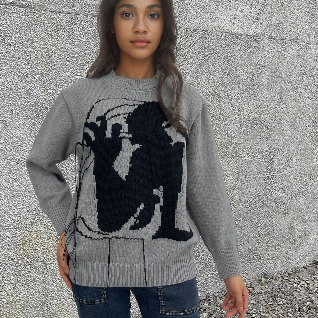 Women's grey alpaca wool sweater with abstract tassel design and round neck