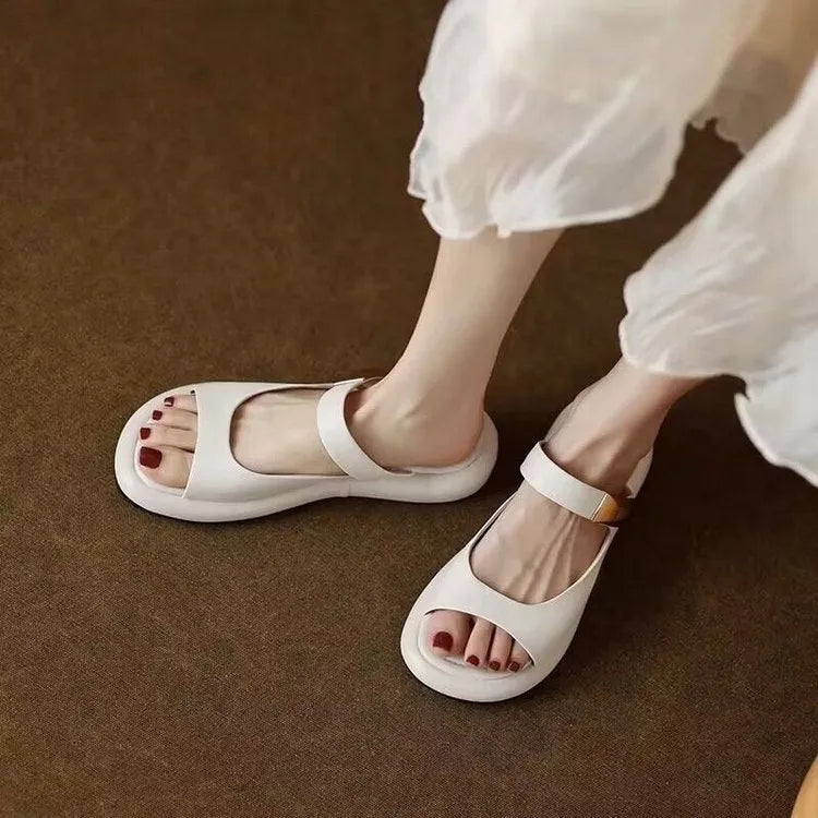 Women's peep toe flat sandals in soft leather with rubber platform sole in apricot colour