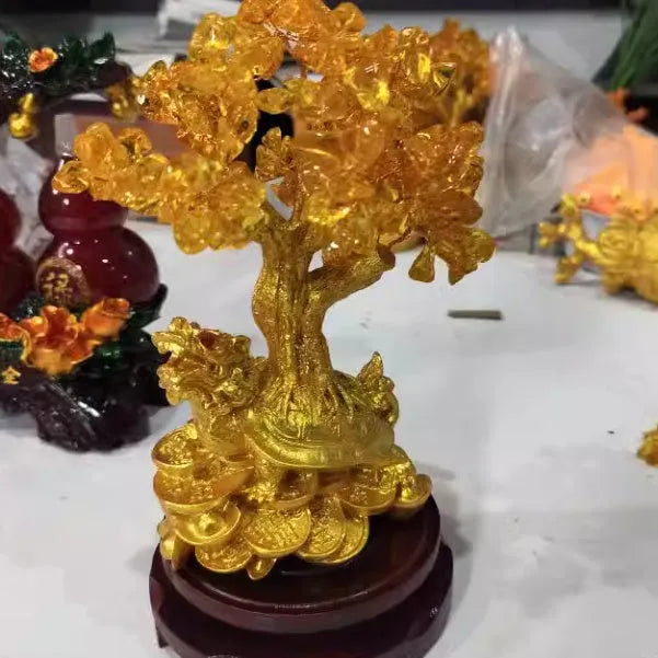 Citrine small water turtle money tree Feng Shui ornament made from resin.