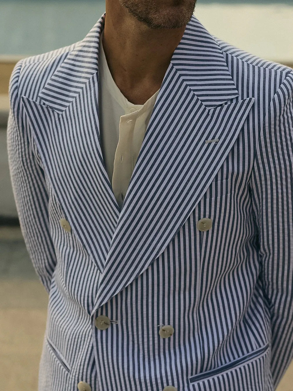 Blue and white striped polyester suit set with blazer and trousers for professional daily wear