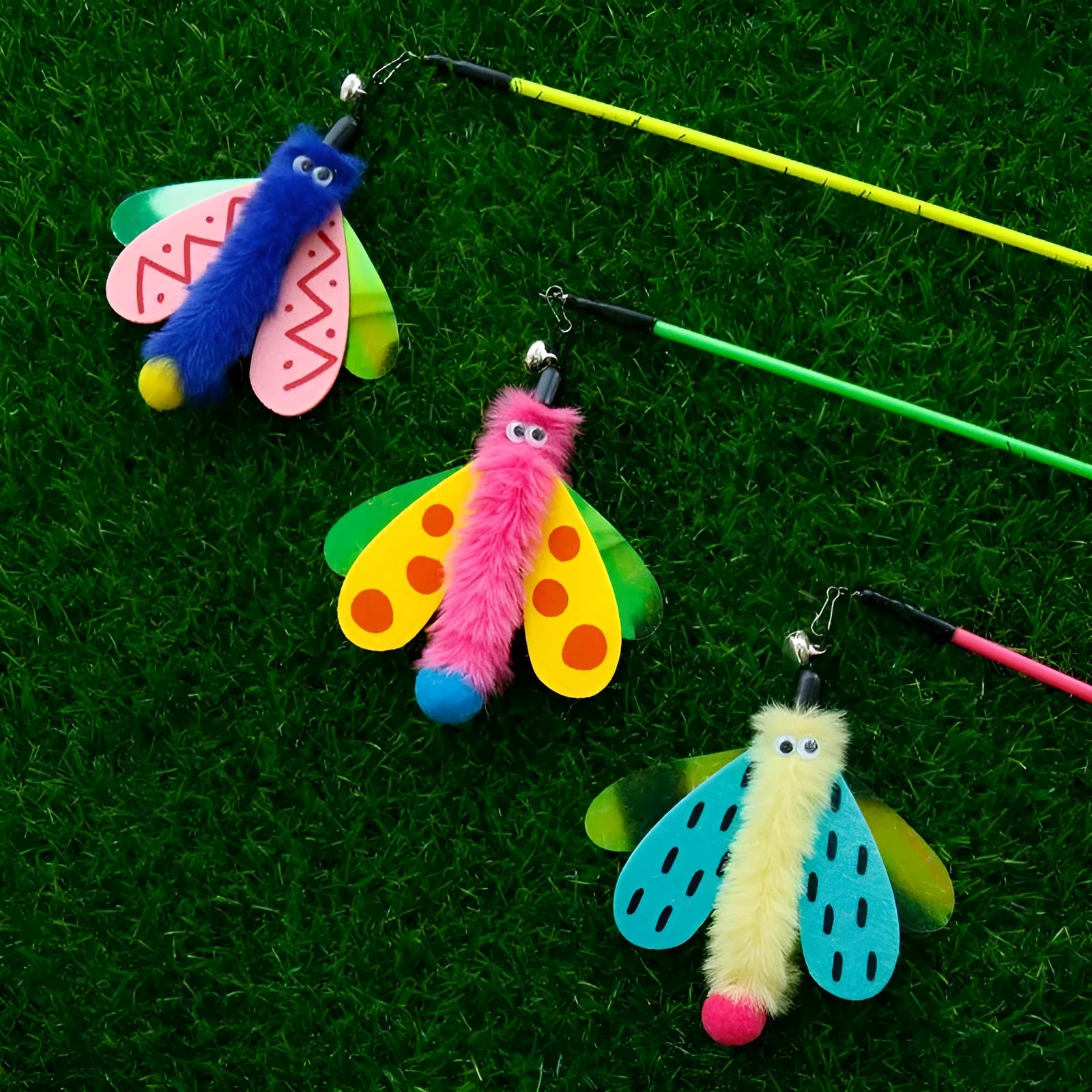 Blue, yellow, and pink dragonfly cat wand toy with bell on a long plastic stick.