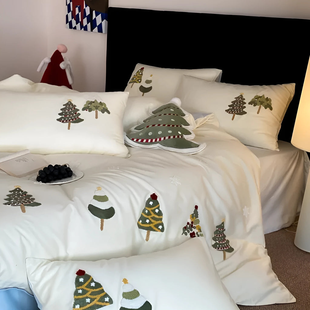 Pure cotton duvet cover set with embroidered Christmas trees and flowers, shown in cream blue colour.