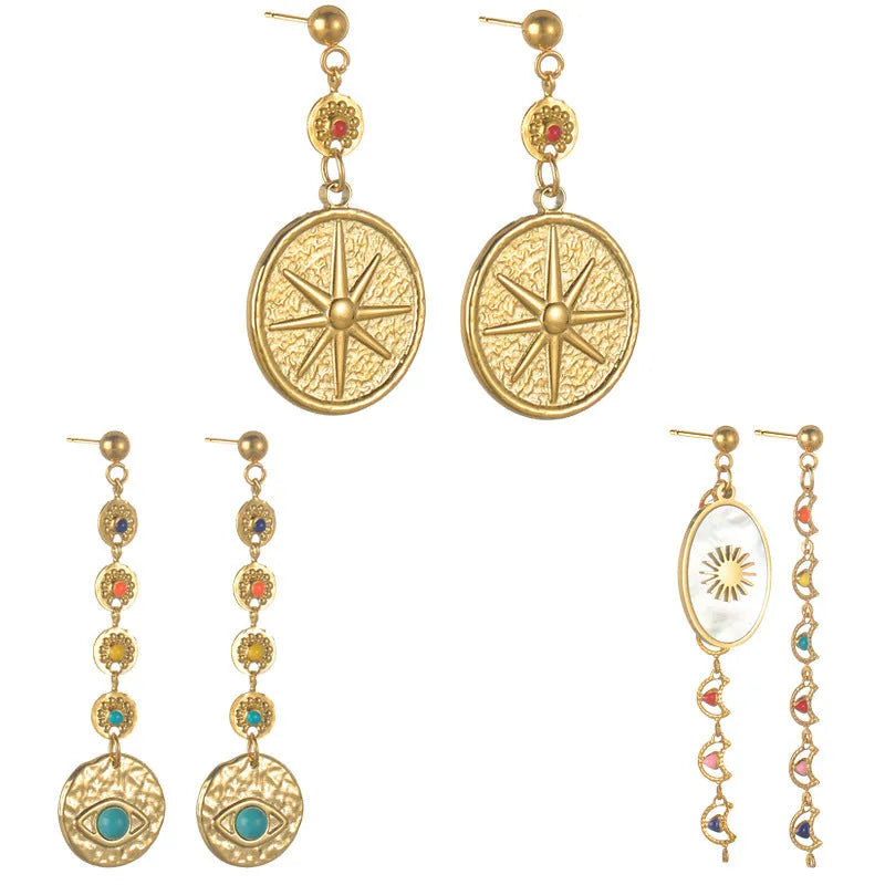 Stainless steel geometric earrings showing eight Awn XINGX, eye, and shell sun designs.