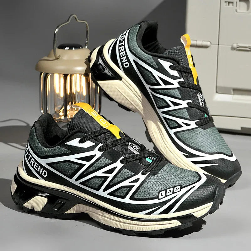 Men's and women's low top hiking shoes with artificial leather upper and rubber sole in black silver and khaki colors for outdoor tourism