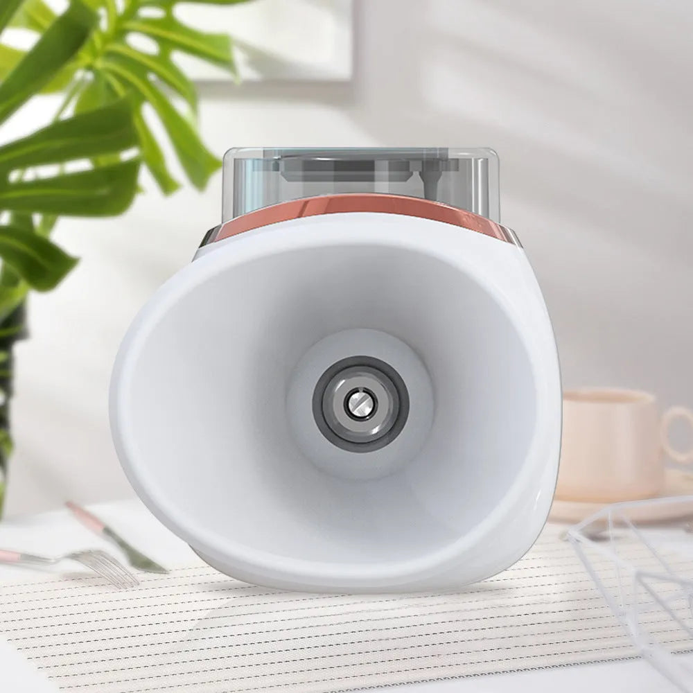 White portable eye humidifier with USB charging cable on wooden table