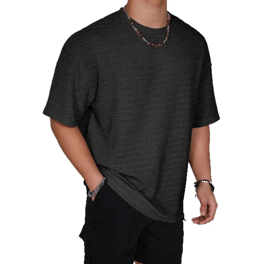 Men's slim fit polyester t-shirt in solid colours with round neck and short sleeves