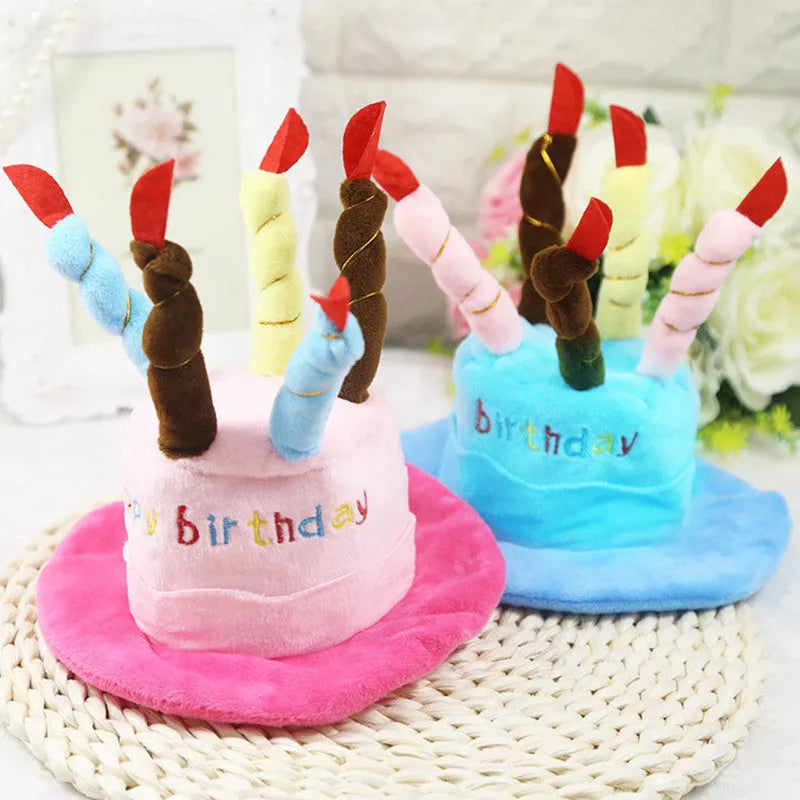 Blue and pink birthday hats for small dogs with elastic bands, shown with dimensions 21cm by 15cm.