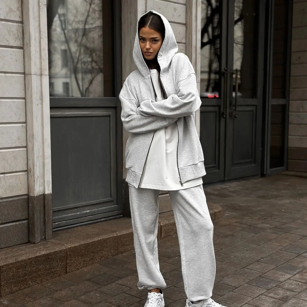 Street style loose-fit two-piece set with long-sleeved coat and trousers in grey.