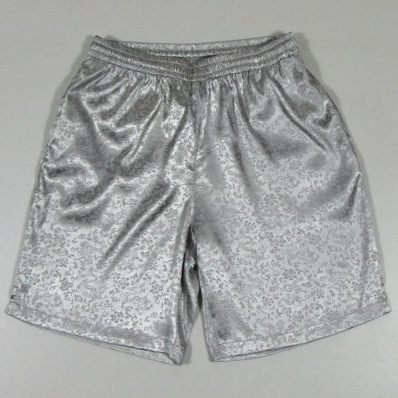 Men's black elastic drawstring Tai Chi shorts made from lightweight polyester fabric.