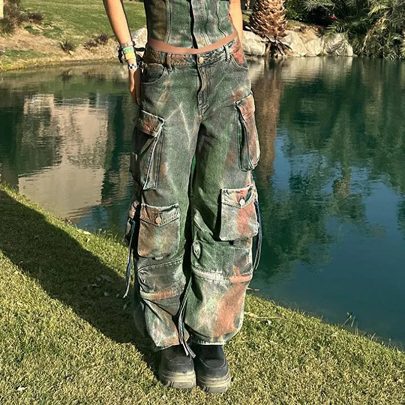 Men's loose cargo denim trousers with gradient colour pockets and multiple tooling-style compartments
