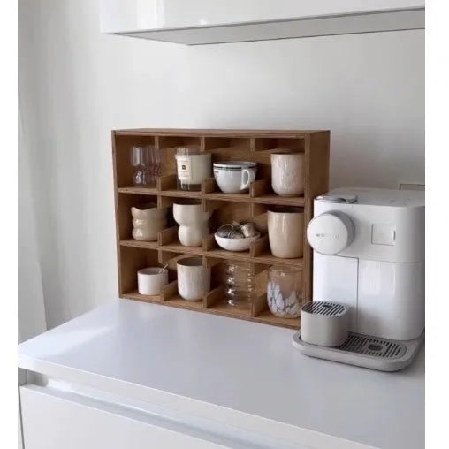Solid wood square cup storage rack with multiple grid compartments in a birch wood meridian colour.