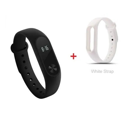 Xiaomi Mi Band 2 black smartband on wrist showing OLED display with heart rate and step count.