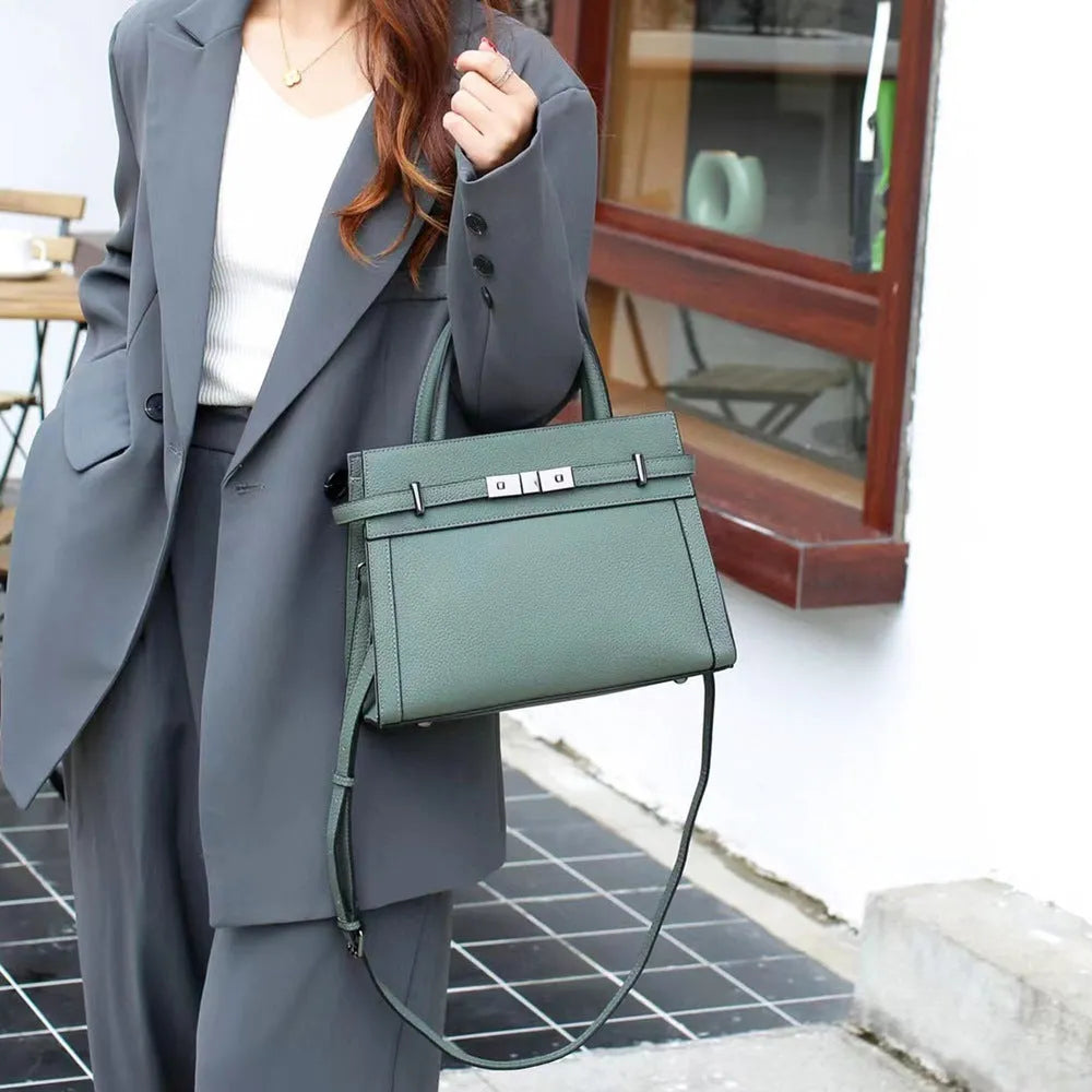 Small square genuine leather shoulder bag in almond green with sandwich pocket exterior