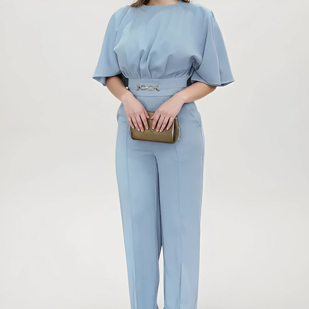 Blue men's casual polyester suit set with trousers and a long-sleeved shirt on a mannequin