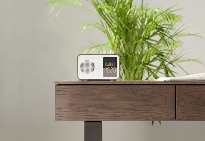 Brown retro Bluetooth radio speaker with wooden cabinet and classic control knobs